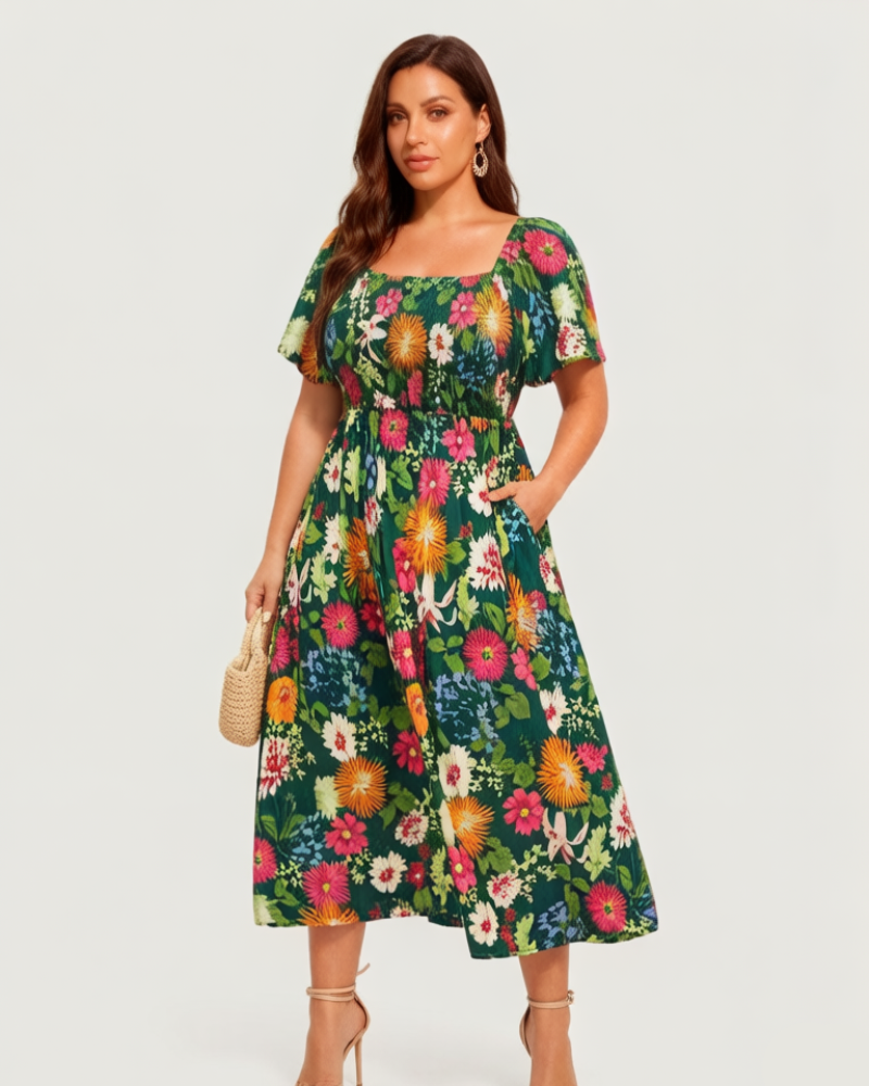 Vestit midi de flors, coll quadrat i gofrat, amb butxaques