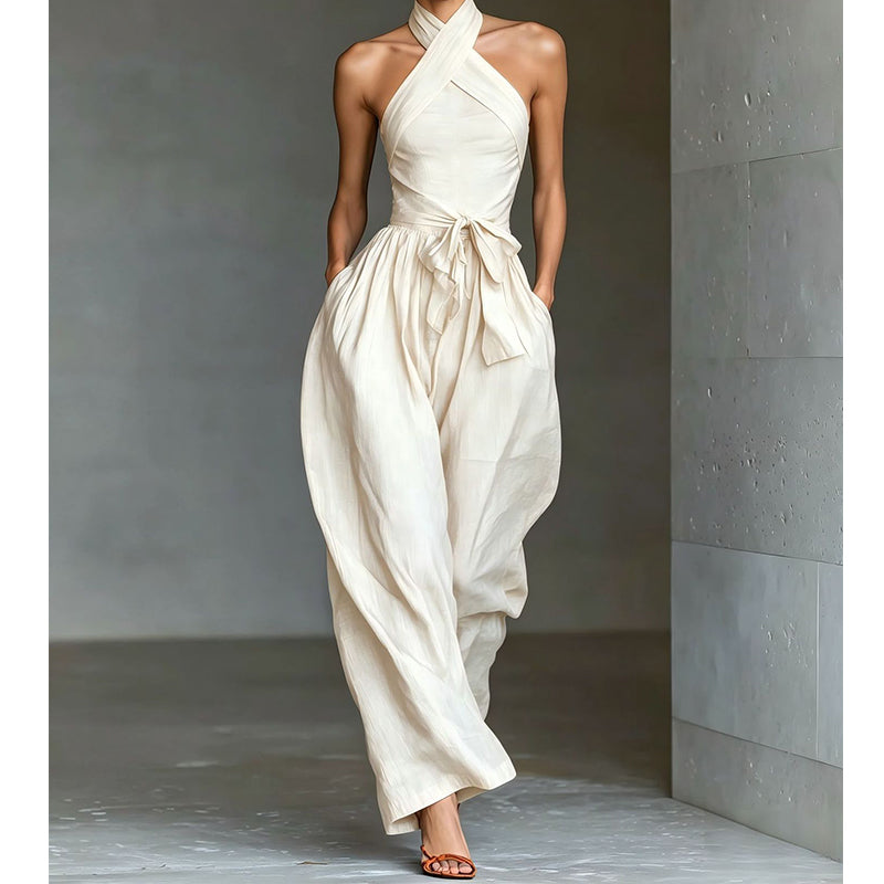 Elegant ermeløs jumpsuit med åpen rygg og snøring i livet