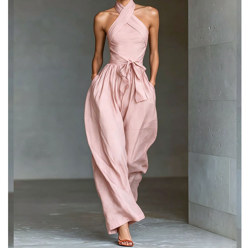 Elegant ermeløs jumpsuit med åpen rygg og snøring i livet