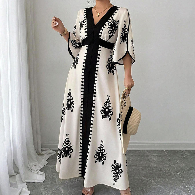 Vestit llarg elegant per a dona amb estampat i coll en V