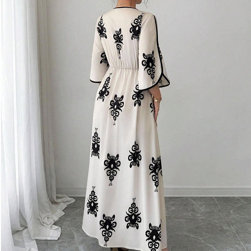 Vestit llarg elegant per a dona amb estampat i coll en V