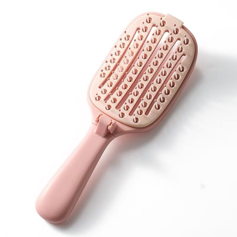 Brosse à cheveux pliable autonettoyante