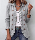 Chaqueta de canalé gris jaspeado con volantes