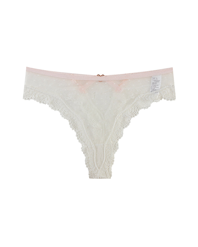 String sexy transparent à pois et découpes en dentelle